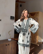 Aarika Ivory Black Embroidered Cotton Kurta Pant Set